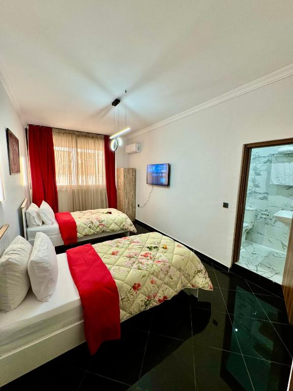 Postel nebo postele na pokoji v ubytování The Hotel Syracuse