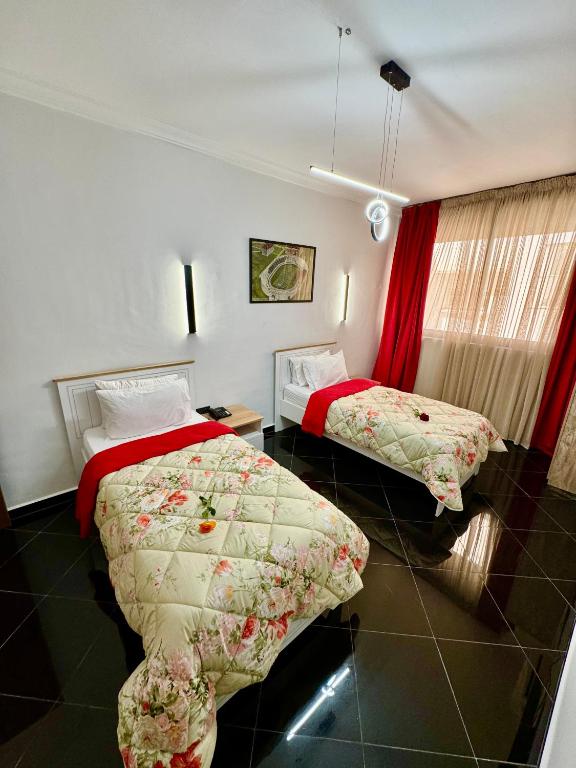 Postel nebo postele na pokoji v ubytování The Hotel Syracuse
