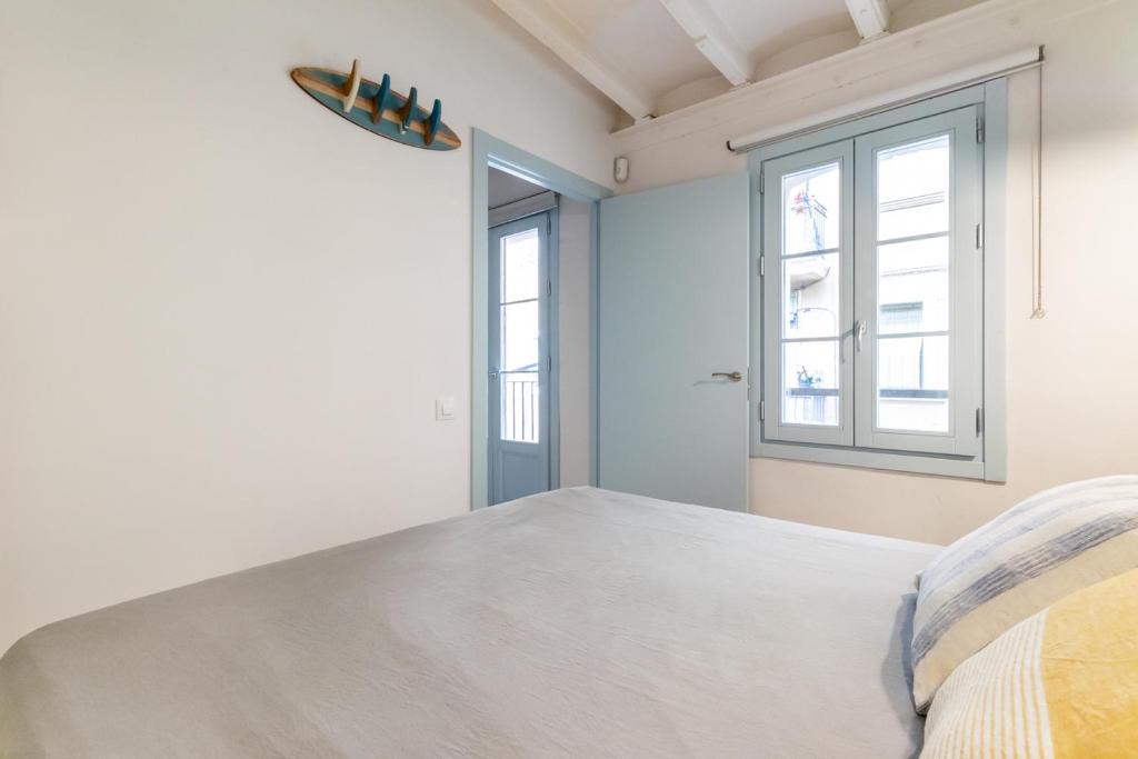 Voodi või voodid majutusasutuse Amazing flat in Barceloneta with private terrace 2-2 toas