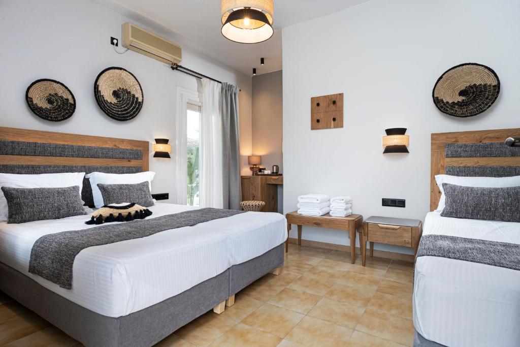 Postel nebo postele na pokoji v ubytování Semiramis Guesthouse