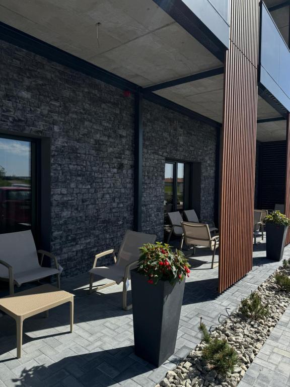 Posezení v ubytování Molėtai Hotel
