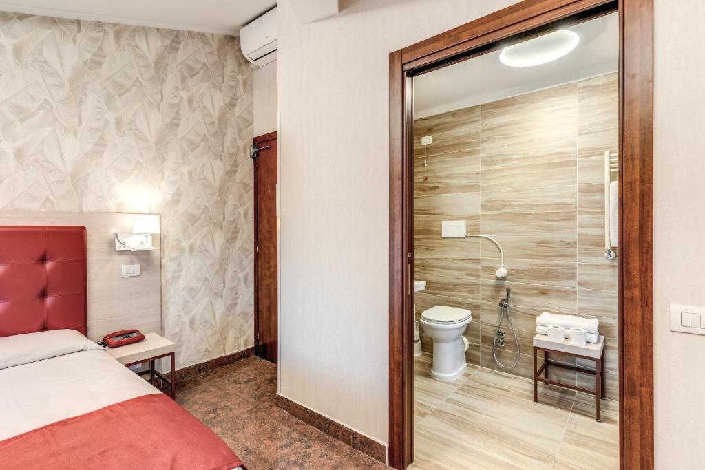 Koupelna v ubytování Hotel Milo