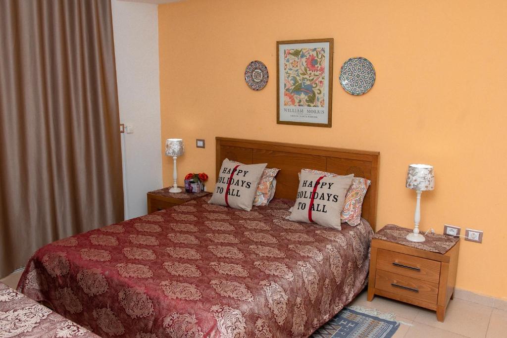 Postel nebo postele na pokoji v ubytování Dar Marrakech Apartment Sousse