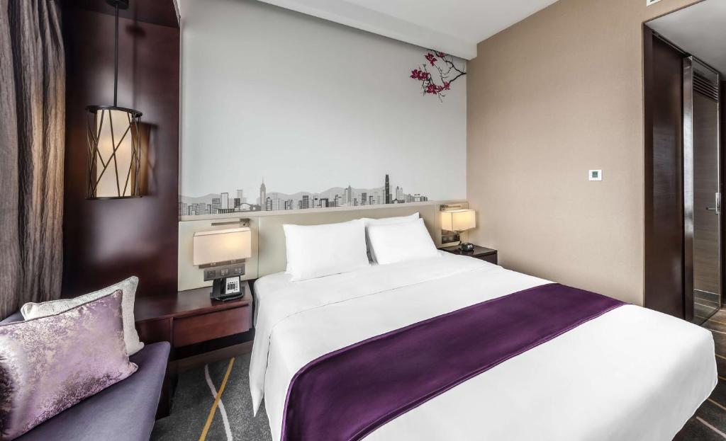 Letto o letti in una camera di Hilton Garden Inn Hong Kong Mongkok