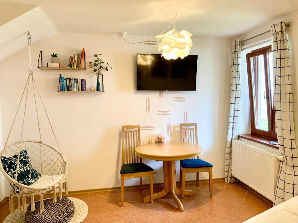 a dining room with a table and chairs at Apartment Bc in Bovec