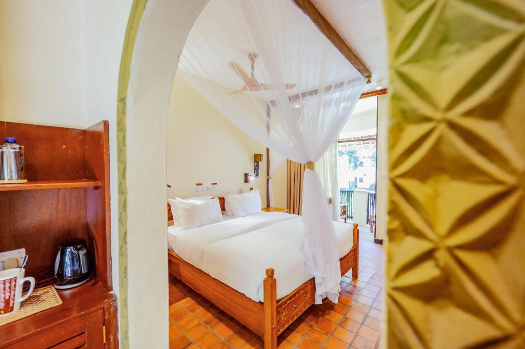 Postel nebo postele na pokoji v ubytování Severin Sea Lodge