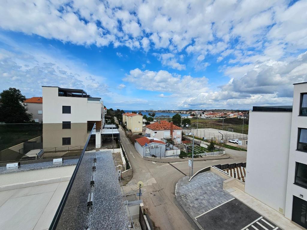 a view of a city from a building at Apartment Marija in Petrcane