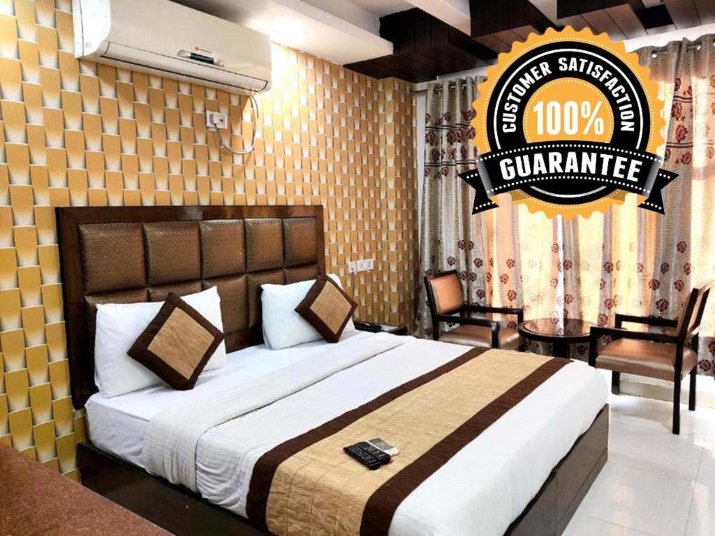 Postel nebo postele na pokoji v ubytování Hotel Delhi Pride, Karol Bagh