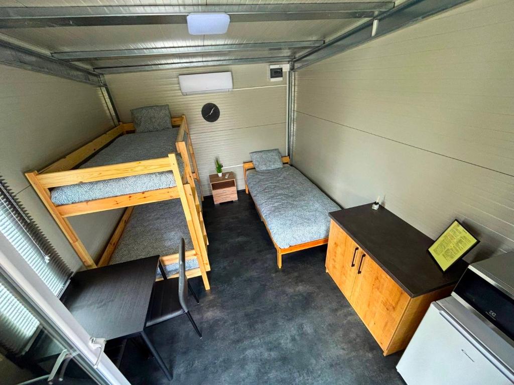 Postel nebo postele na pokoji v ubytování Kaposfuredi Horgaszparadicsom