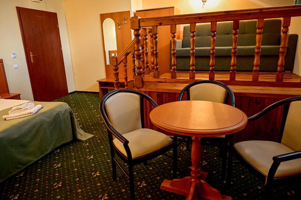 Postel nebo postele na pokoji v ubytování Pensiunea Anotimpuri