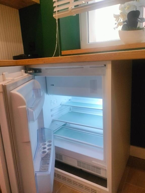 Kuchyň nebo kuchyňský kout v ubytování Apartament Paradise Zarządzany przez gospodarza osobę fizyczną Self check in