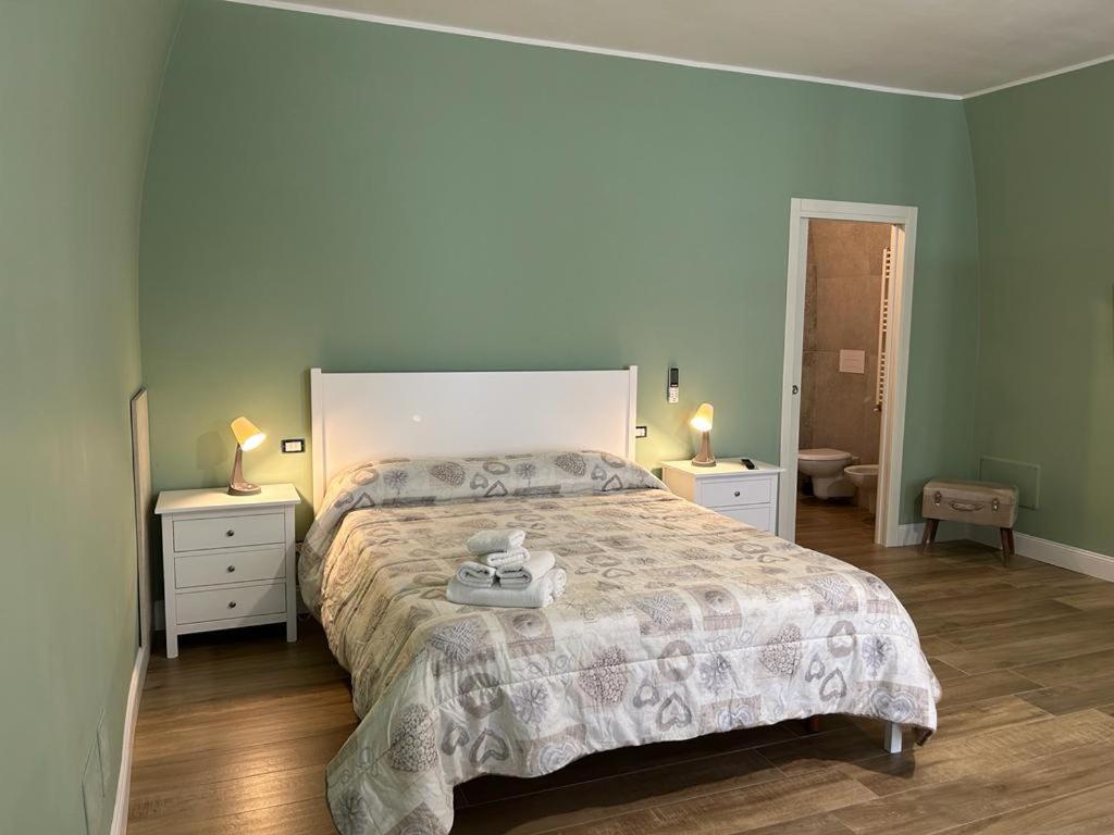 Posteľ alebo postele v izbe v ubytovaní RoMa Apartment & Room