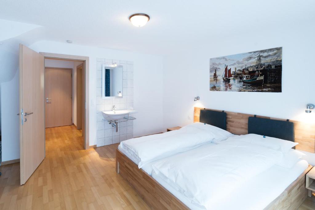 Postel nebo postele na pokoji v ubytování Haus Shangri-La