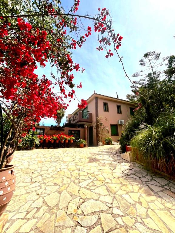 Zahrada ubytování Okeanis Apartments & Suites Adults Only