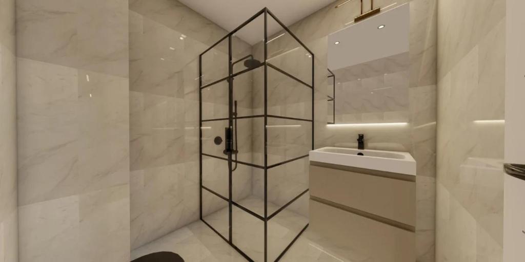 y baño con ducha y lavamanos. en Aymira Suite Hotel, en Estambul