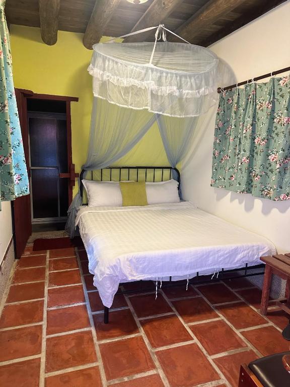 Postel nebo postele na pokoji v ubytování XQ B&B