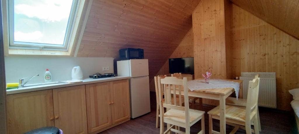 Kuchyňa alebo kuchynka v ubytovaní Apartmány u Bernardů