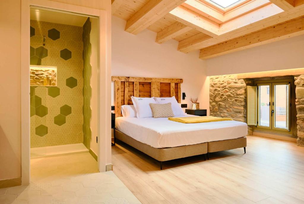 Postel nebo postele na pokoji v ubytování Hotel Molí Cardedeu