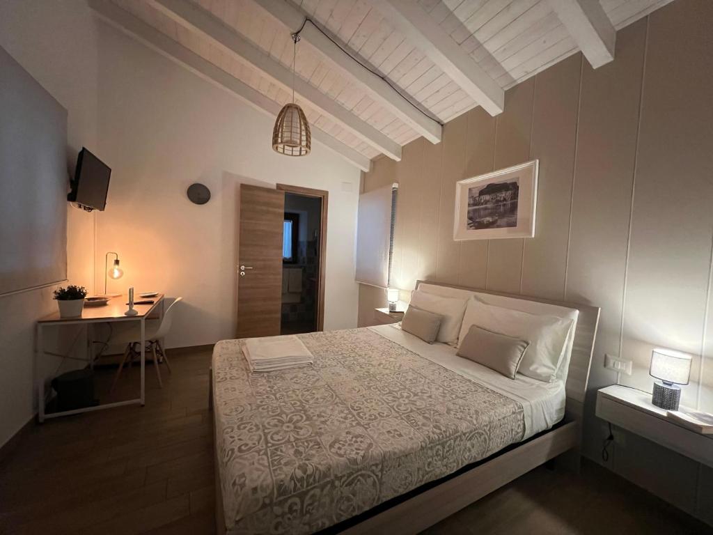 Katil atau katil-katil dalam bilik di Dimora del Pescatore - Holiday House