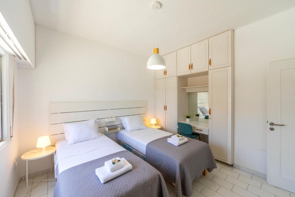 Letto o letti in una camera di Protaras O2 Seaside Suite