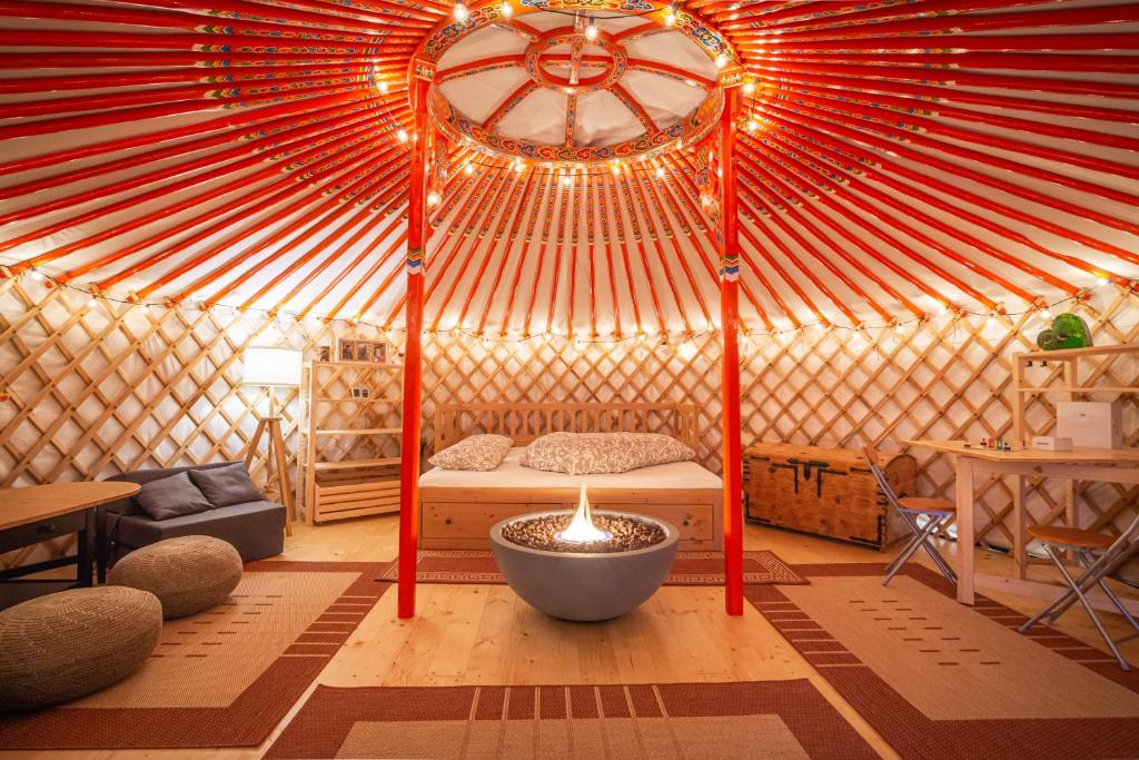 a room with a yurt with a bowl in it at Jurta pod Kriváňom in Vavrišovo