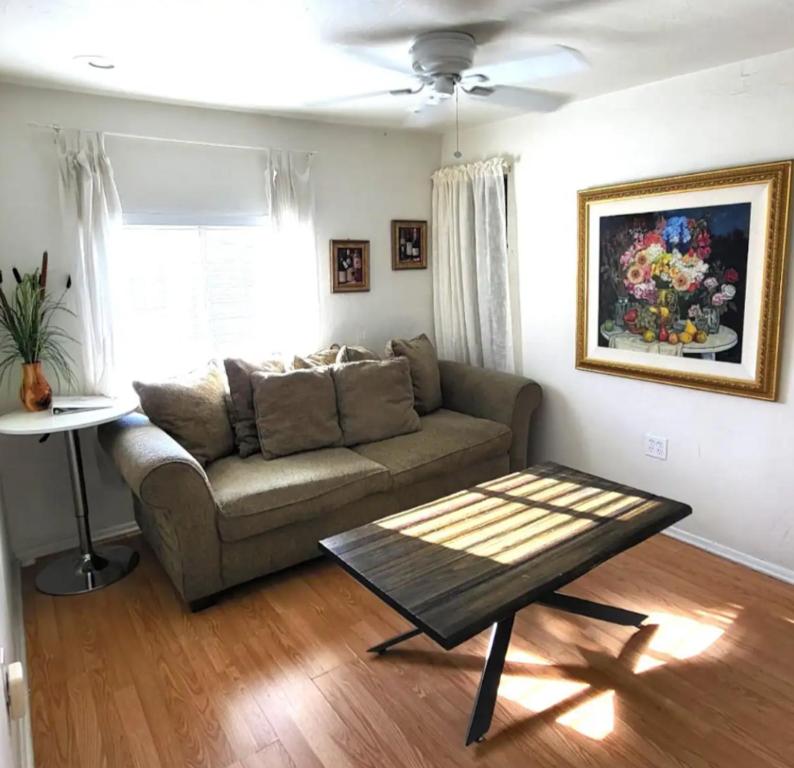a living room with a couch and a table at U4 - Cozy 1BR & 1BA Walkup APT in DT PHX with pkg in Phoenix