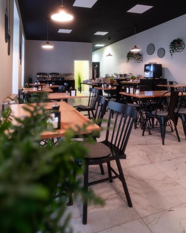 Reštaurácia alebo iné gastronomické zariadenie v ubytovaní City Center Rooms Piotrkowska 91
