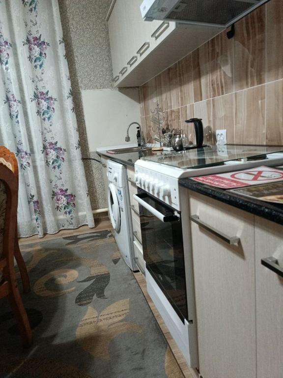 Kuchyň nebo kuchyňský kout v ubytování Oskar