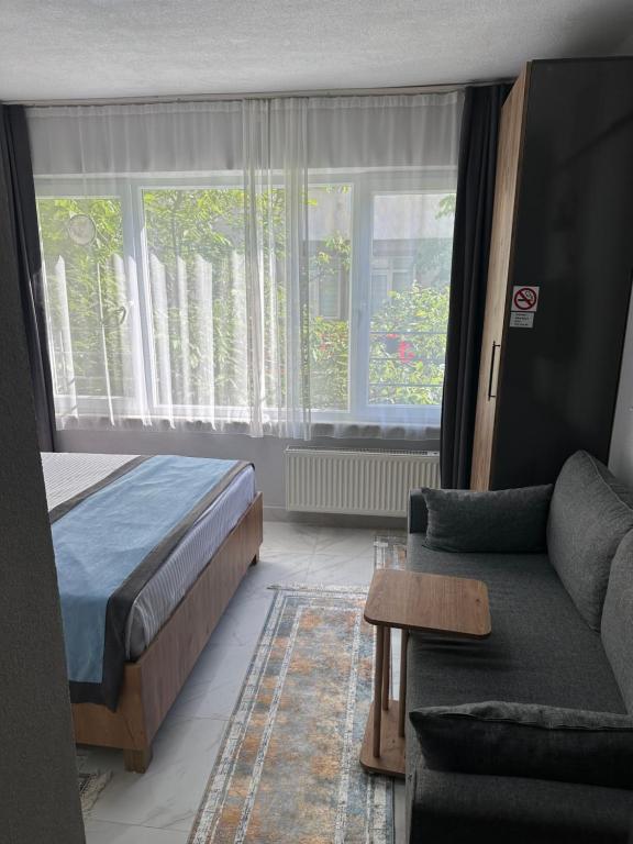 Alha apart otel - Deluxe Double Room (2 Adults + 1 Child)