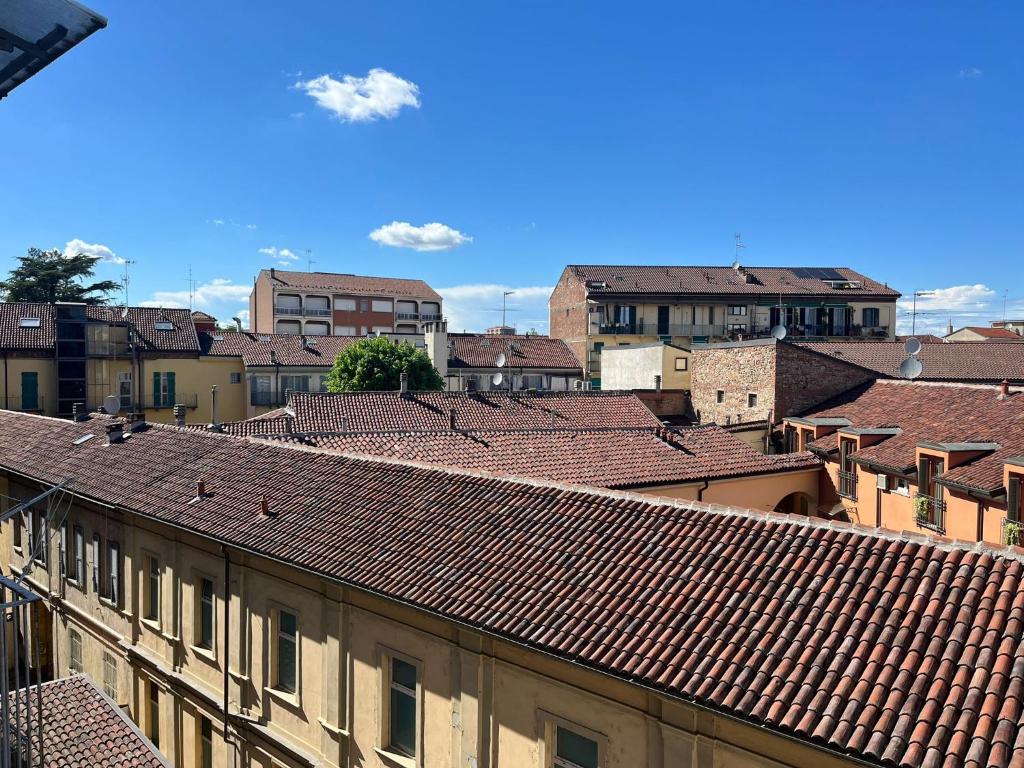 a view of roofs of a city with buildings at Casa GIULIVA in Alessandria