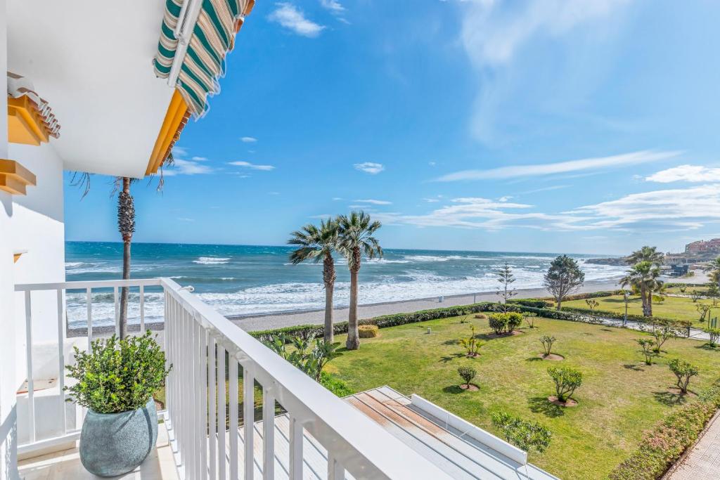 a balcony with a view of the ocean at Seaflower Torrox Costa in Torrox Costa