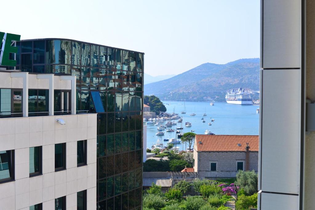 a view of a harbor from a building at Apartment Navigatio with parking in Dubrovnik
