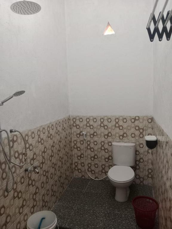 Koupelna v ubytování Mentos Bungalowz Riung