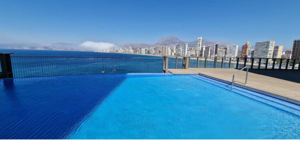 a large swimming pool on the roof of a building at Gemelos 28 in Benidorm