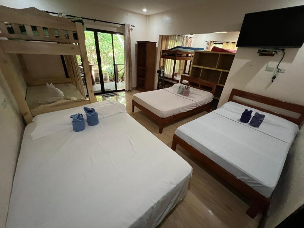 Postel nebo postele na pokoji v ubytování Adayo Cove Resort