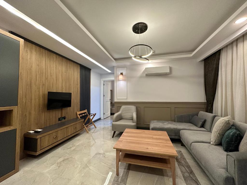 TV a/nebo společenská místnost v ubytování Quality Gold Suite Hotel
