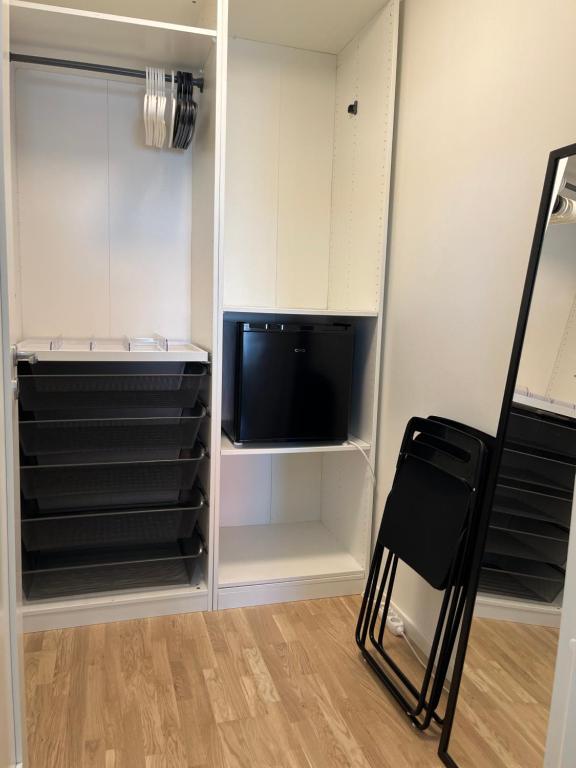 TV a/nebo společenská místnost v ubytování Boende med hotellkänsla i populära Skrea, Falkenberg