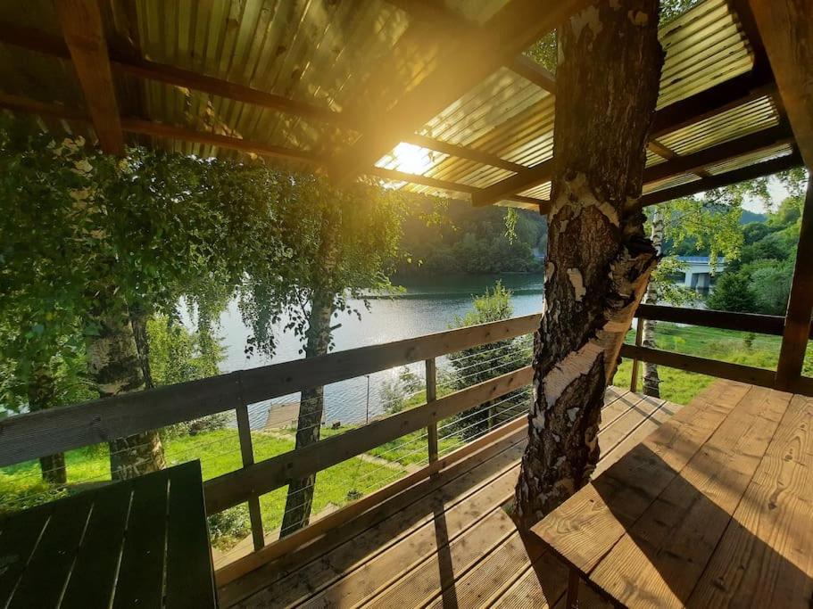 A balcony or terrace at Brand new chalet inside beautiful nature