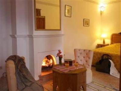 Posezení v ubytování Riad Chameau FDC Hôtel SPA