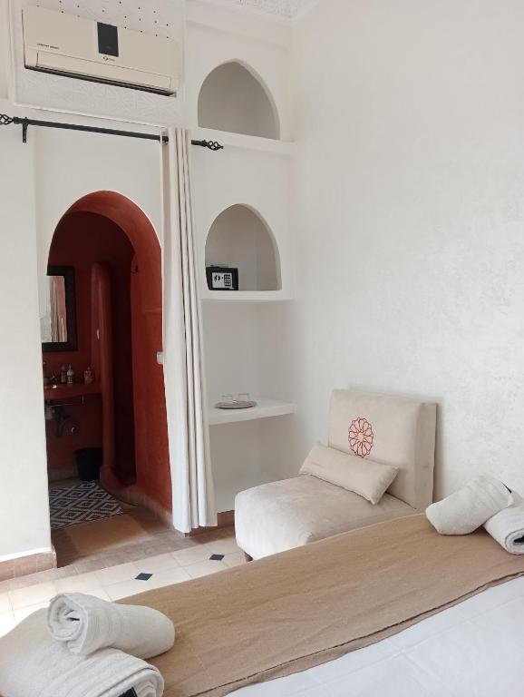 Postel nebo postele na pokoji v ubytování Le riad de l'étoile ocre - COTG