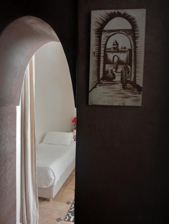Postel nebo postele na pokoji v ubytování Le riad de l'étoile ocre - COTG