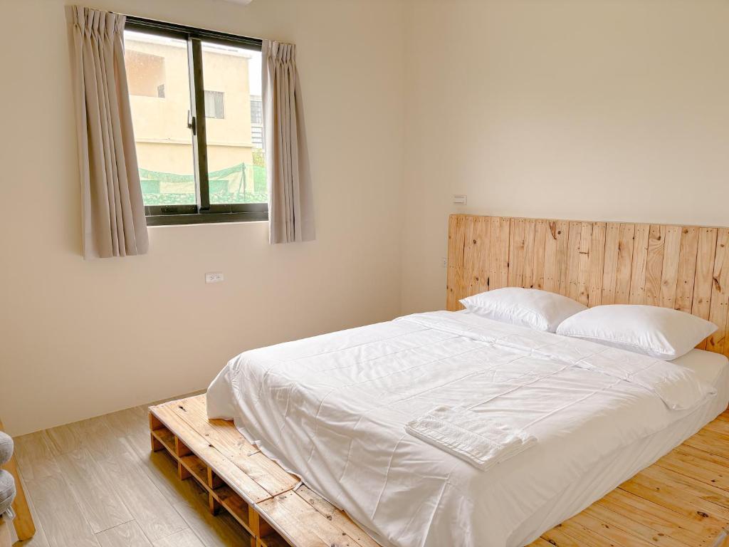 Postel nebo postele na pokoji v ubytování Lunos homestay