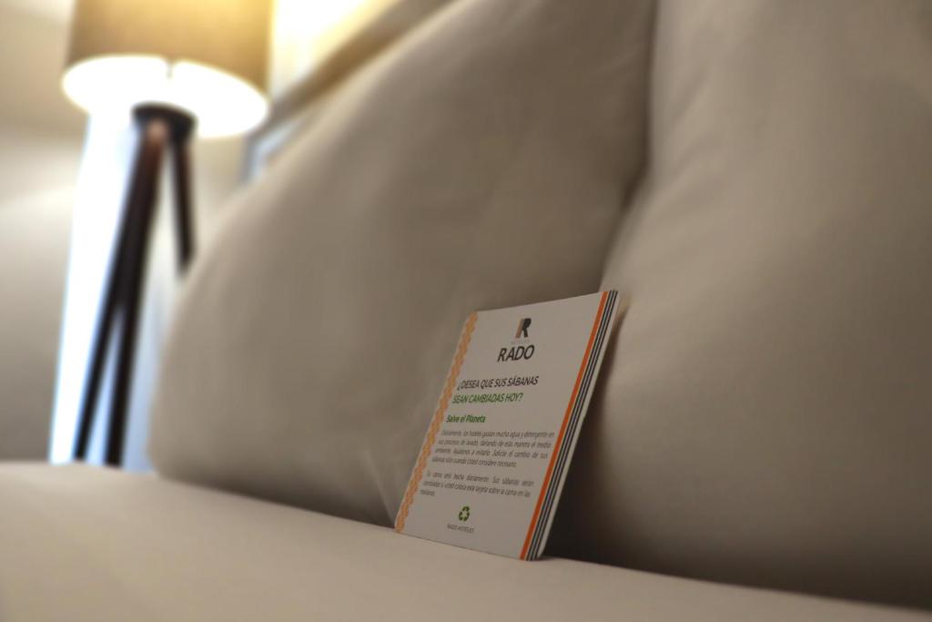 Postel nebo postele na pokoji v ubytování Rado Hotel - Quintanas