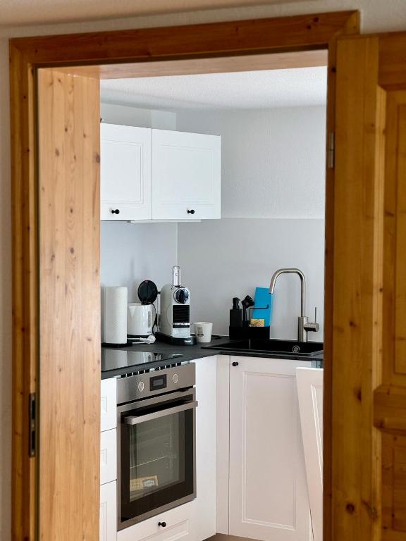 Kuchyň nebo kuchyňský kout v ubytování Charmantes Bauernchalet Alois