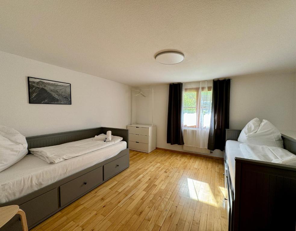 Postel nebo postele na pokoji v ubytování Charmantes Bauernchalet Alois