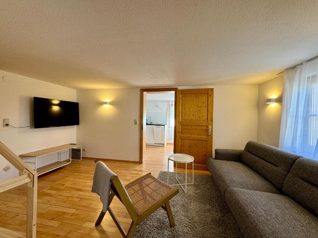 TV a/nebo společenská místnost v ubytování Charmantes Bauernchalet Alois