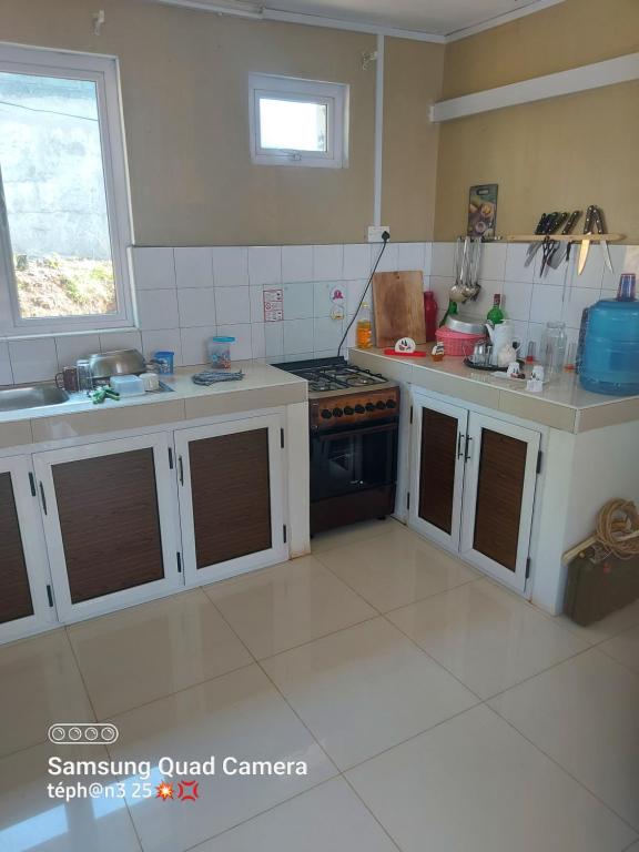 Kuchyň nebo kuchyňský kout v ubytování L'Ancre d'Ulysse