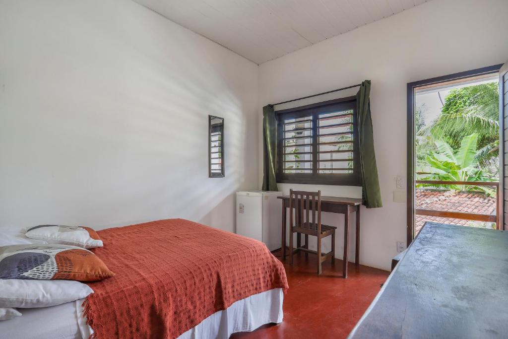 Ένα ή περισσότερα κρεβάτια σε δωμάτιο στο No Worries Pipa