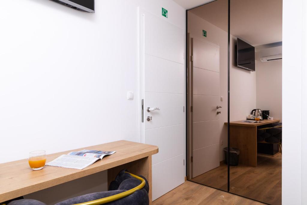 TV a/nebo společenská místnost v ubytování Scaletta Rooms