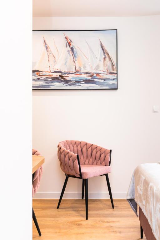 Postel nebo postele na pokoji v ubytování Scaletta Rooms